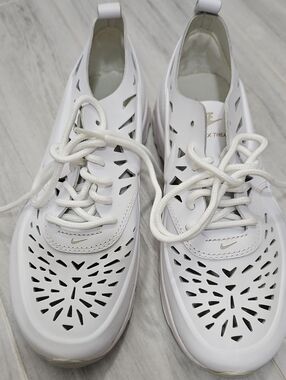 Nike Women’s White Laser-Cut Lace-Up Sneakers